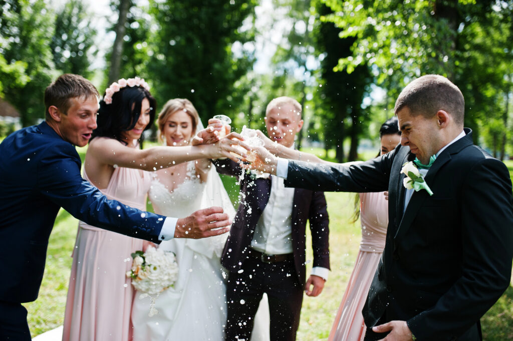 Happy Wedding Toast with the bride, groom and friends.