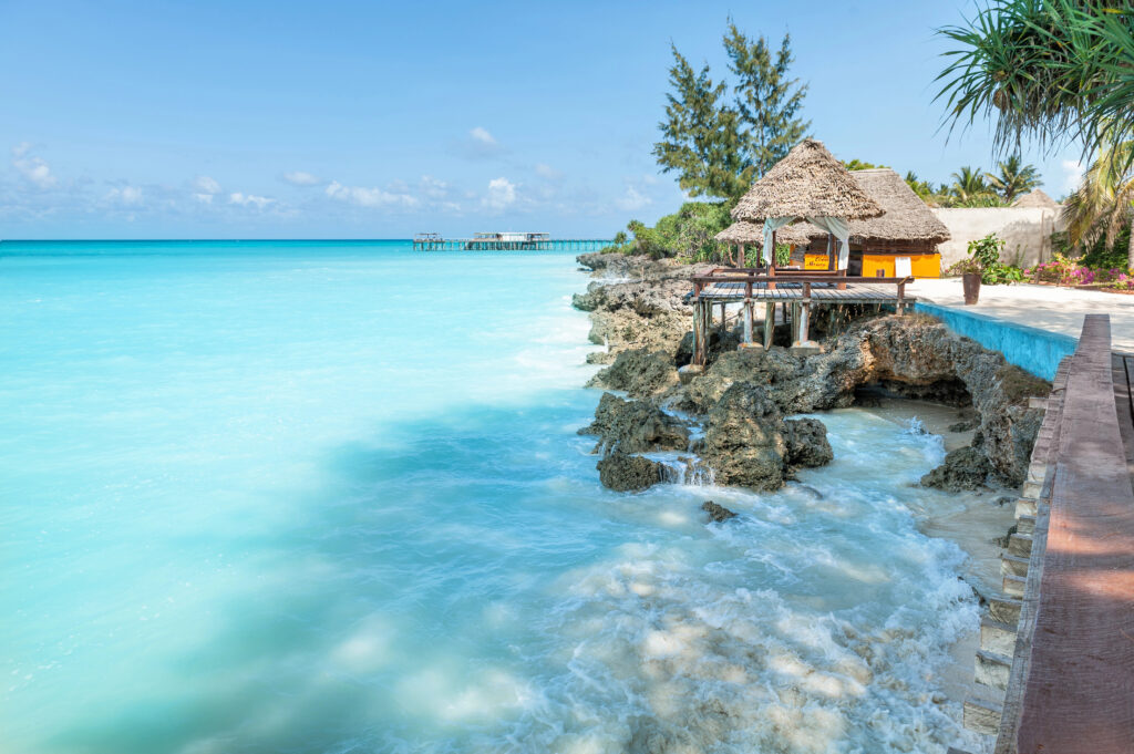 island paradise with a bungalow overlooking the sea